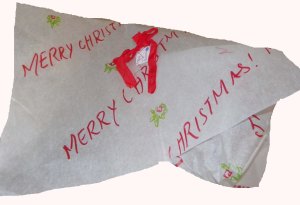 My oldest daughter decorated this wrapping paper herself. That was even cooler than the gift inside!