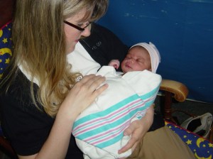 Here I am the first time I met my gorgeous baby Charlotte, the day after her birth.